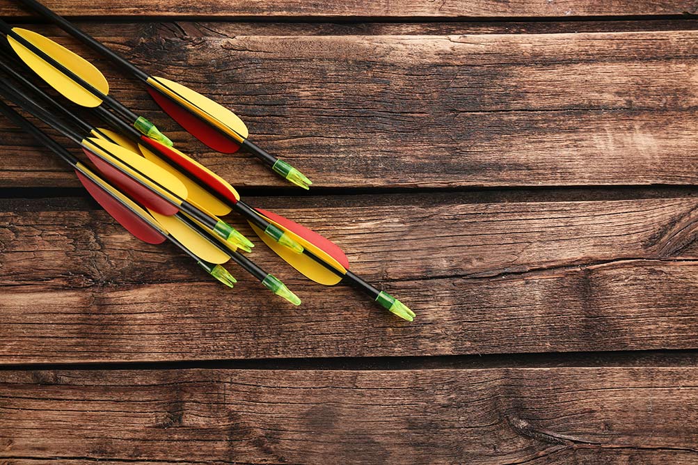 arrows on wood background